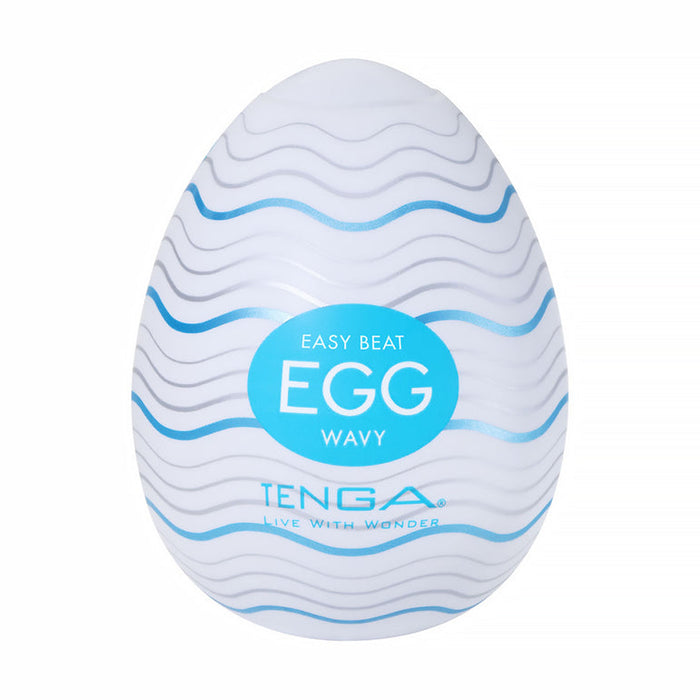 A white, egg-shaped male masturbator with wavy blue lines, featuring a textured sleeve for heightened pleasure. Sold as the "Tenga Egg Standard 3 Pack Disposable Masturbators I," with branding on the front.
