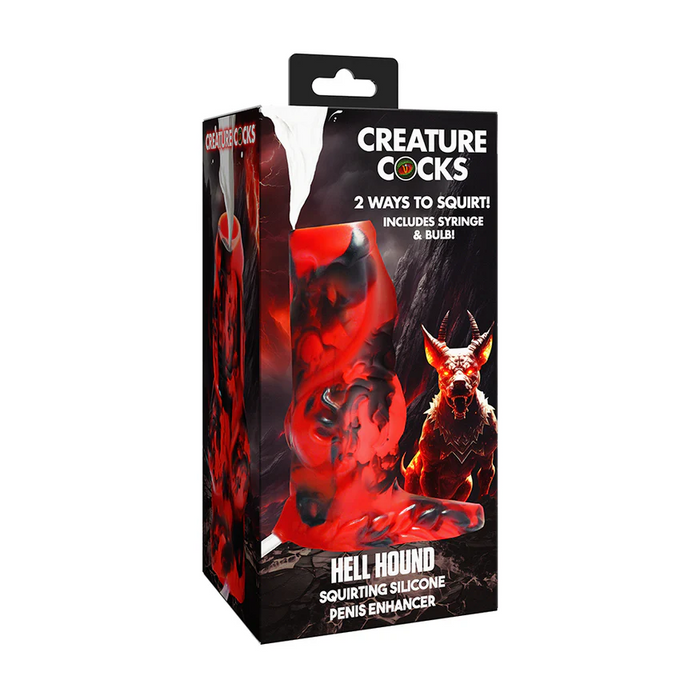 A box labeled "Hell Hound Canine Squirting Penis Enhancer" features a fiery red and black fantasy design with a demonic hound illustration, highlighting this unique toy plus included syringe and bulb.