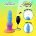 A vibrant, textured Splash Nova Squirting 10 Inch Glow in the Dark Creature Dildo with a suction base and black squeeze pump is shown. Inset circles highlight its squirting function and details. Branding shows "Camtovz Kosmos" on a gradient background.
