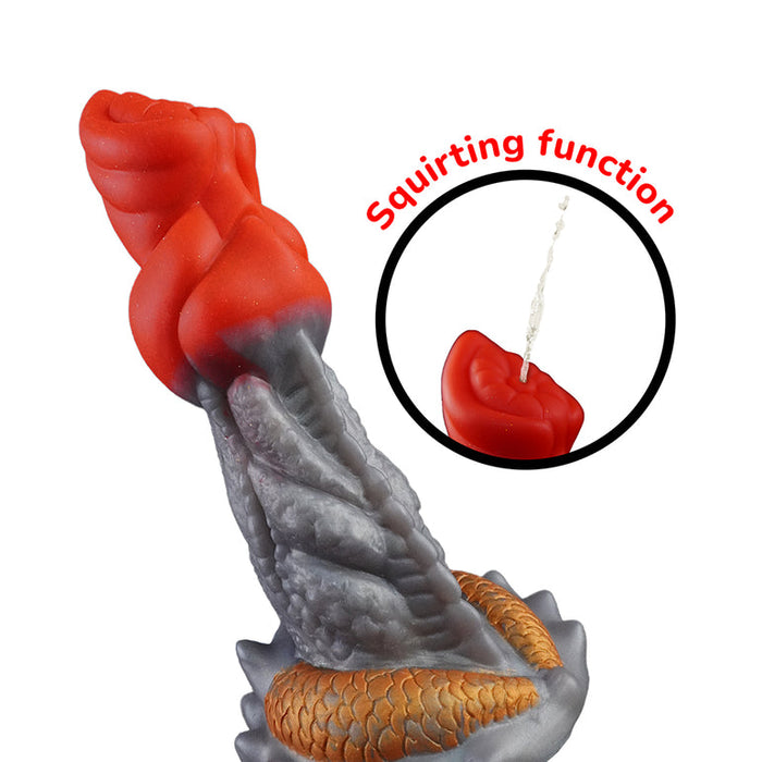 The Splash Garon Squirting 7.5 Inch Dragon Creature Dildo, shown in red and gray with a spiral shape and scaled texture, features an inset highlighting its squirting function with liquid emerging from the tip.