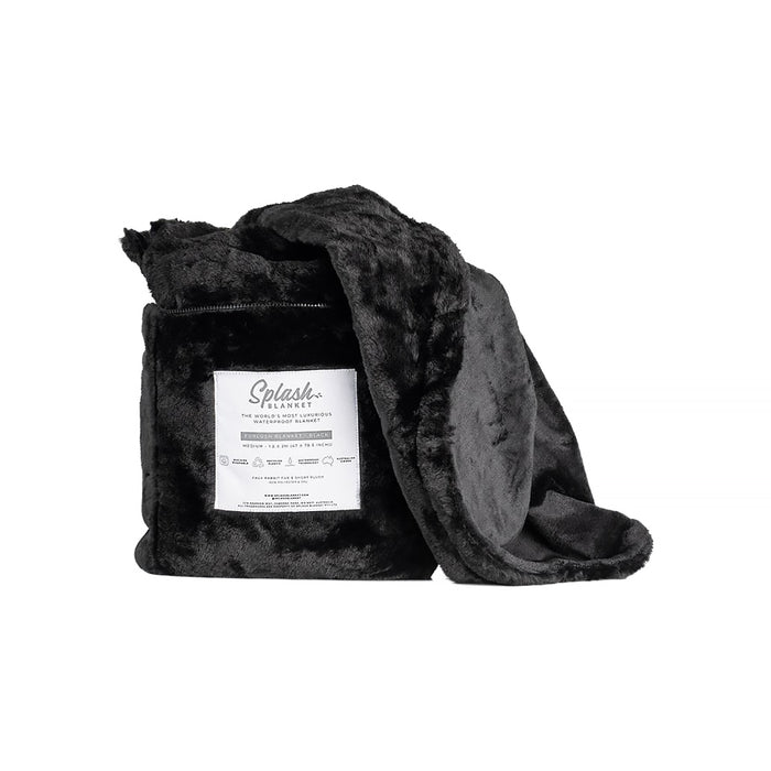 The Splash Blanket Furlush Luxurious Faux Fur Waterproof Blanket (Small) is a folded black faux rabbit fur blanket with a branded care label on one side, displayed against a plain white background.