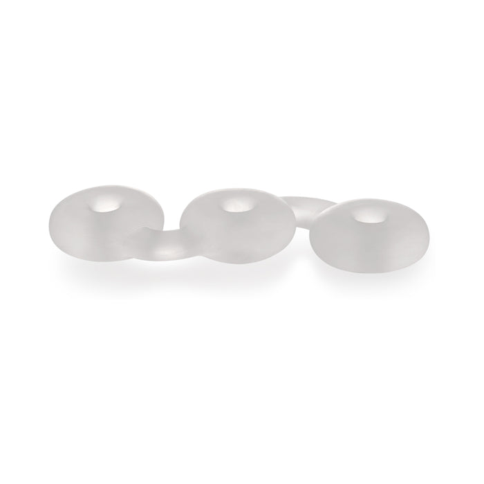 A clear, frosted glass-like object featuring three connected round shapes in a row on a white background resembles the Perfect Fit Triple Donut Ring and Penetration Bumper.
