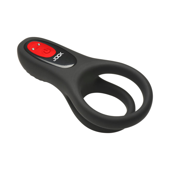 The Hard-On Vibrating Silicone Cock Ring with Clit Stim is a black silicone cock ring with dual loops and a red-and-black "JOCK" control button, shown on a white background, designed for couples' intimate use.