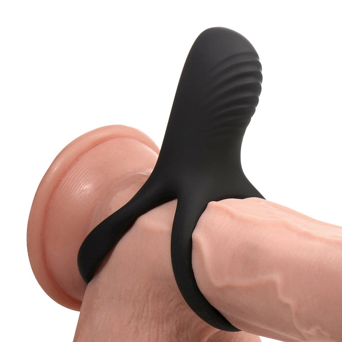 The Hard-On Vibrating Silicone Cock Ring with Clit Stim, shown on a realistic penis model, features black silicone construction and a textured stimulator for couples seeking enhanced pleasure.