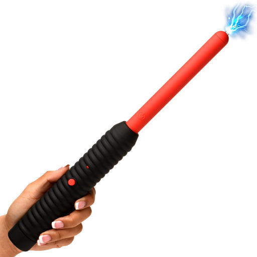 A hand holds the Spark Rod Electro Stimulation Zapping Wand, a black and red device with a blue electric spark at the tip, indicating the wand is turned on.