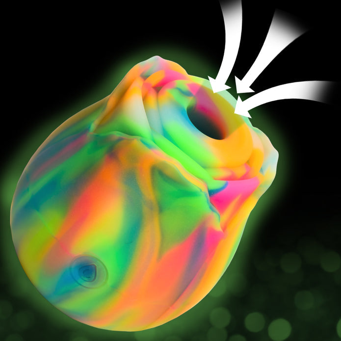 The Bloomgasm Glow Rose Glow-in-the-Dark Clitoral Stimulator, a soft, round suction vibe with a wide top opening, is shown against a dark background with green glow; white arrows highlight its air pulse technology.