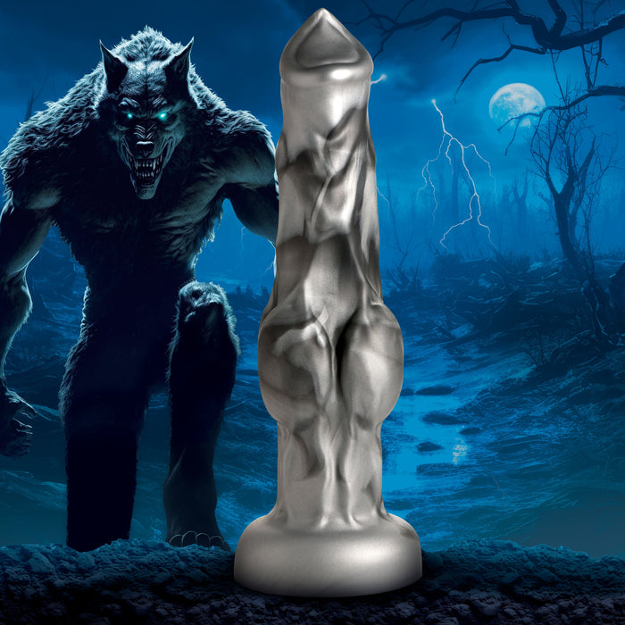 A detailed metallic fantasy sculpture stands upright, with a menacing werewolf and the Night Prowler 10 Inch Werewolf Canine Dildo with Knot amid barren trees and a full moon in a dark, eerie landscape.