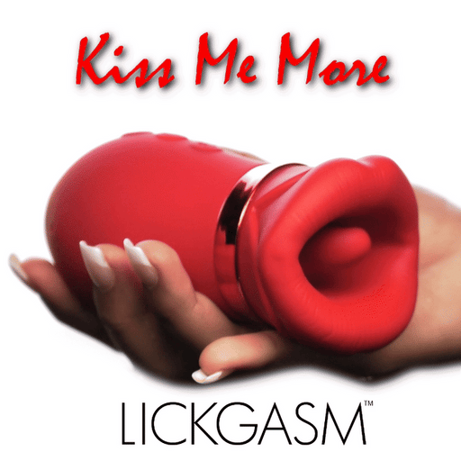 Red silicone clitoral stimulator shaped like lips with a vibrating tongue held in a hand.