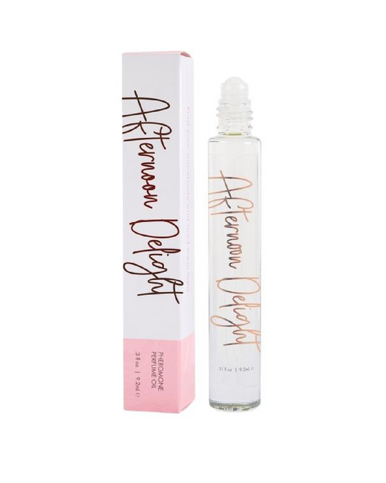 Afternoon Delight Perfume Oil with Pheromones bottle next to box 
