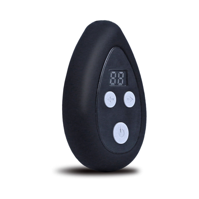 The Aneros Eupho Syn V Vibrating Silicone Prostate Massager's small, black, oval remote features a digital display and four white buttons—arrows, plus sign, and power—for adjusting vibration patterns; shown against a white background.