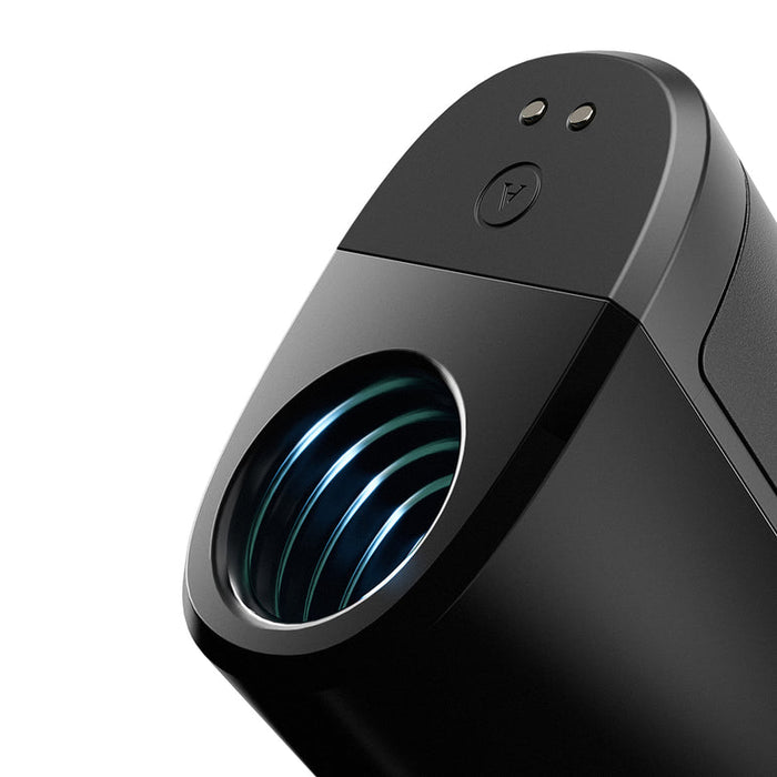 Close-up of the Arcwave Ion 2 Penis Masturbator with Pleasure Air Suction, a sleek black silicone stroker featuring a circular opening with metallic rings and two small round buttons for innovative stimulation.