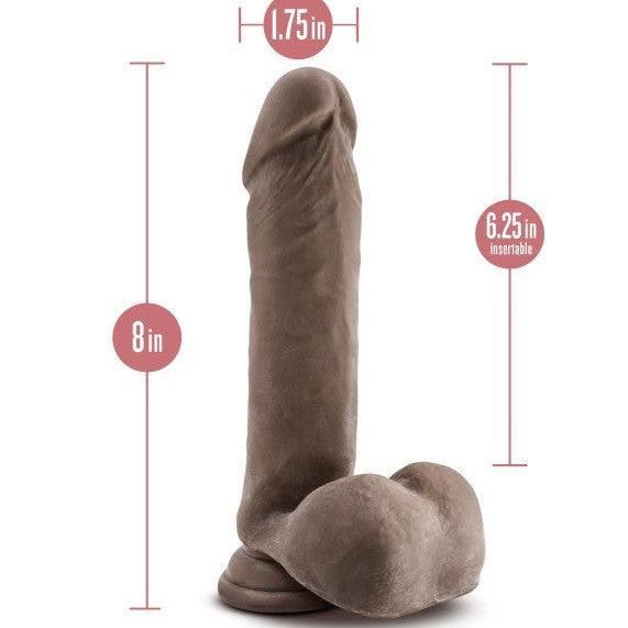 The Au Naturel Long 8 Inch Dual Density Dark Tone Suction Cup Dildo with Balls features lifelike textures, 6.25 inches insertable length, and 1.75-inch diameter—ideal for realism, solo play, or use with a strap-on harness.