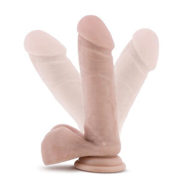 The Au Naturel Long 8 Inch Dual Density Light Tone Suction Cup Dildo with Balls features a sturdy suction base, realistic design with testicles, and flexible body—ideal for use as a suction cup dildo or strap-on.