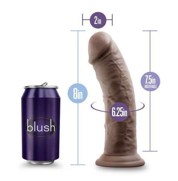 An 8-inch “blush” can sits next to the Au Naturel Thick 8 Inch Realistic Feel Dual Density Dark Tone Suction Cup Dildo. Graphics show its 8" height, 2" diameter, 7.5" insertable length, harness compatibility, and 6.25" circumference.