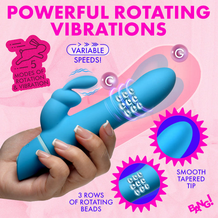 A hand holds the Bang Silicone Rabbit Vibrator with Rotating Beaded Shaft, featuring dual independent motors for internal and external stimulation, 5 vibration modes, variable speeds, 3 rows of rotating beads, and a smooth tapered tip.