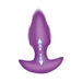 The Bang Thrusting Silicone Butt Plug with Remote Control is a purple silicone anal vibrator featuring curved sides and blue arrows in the center, indicating upward thrusting motion for hands-free stimulation, shown on a white background.