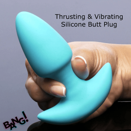 A hand holds a turquoise Bang Thrusting Silicone Butt Plug with curved base. Text reads: "Thrusting & Vibrating Silicone Butt Plug." The word "BANG!" is in the corner. Enjoy hands-free stimulation with remote control for effortless pleasure.