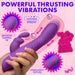 A hand holds the Bang Thrusting Silicone Rabbit Vibrator in purple, featuring a rabbit design, G-spot stimulation, powerful thrusting vibrations, variable speeds, a smooth tapered tip, and 5 modes of thrusting and vibration.
