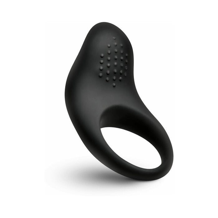 The Bang Beginner-Friendly Vibrating Silicone Cock Ring for Couples is black, features a textured raised dotted area for clitoral stimulation, and a circular opening—perfectly designed to enhance shared sensations during intimacy.