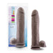 Packaging and product of the Big John Huge 11.5 Inch Dual Density Dark Tone Suction Cup Dildo, shown both boxed and unboxed for a lifelike appearance and feel.