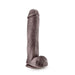 The Big John Huge 11.5 Inch Dual Density Dark Tone Suction Cup Dildo features a realistic design with a pronounced head, textured shaft, testicles, and a strong suction cup for hands-free use.