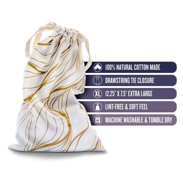 The Blush Embrace White & Gold Toy Storage Bag by Blush is displayed next to text bullets that state: "100% Natural Cotton Made," "Drawstring Tie Closure," "XL 12.25” x 7.5” Extra Large," "Lint-Free & Soft Feel," and "Machine Washable & Tumble Dry." Perfect as a cotton toy bag for various needs.