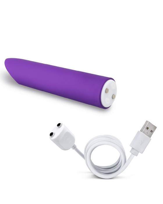 Wellness Power Vibe Waterproof Bullet with Rumble Tech next to charging cord 