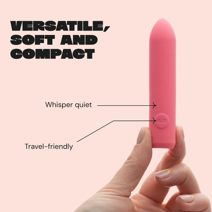 A hand holds the Ily Squishy Classic Silicone Bullet Vibrator—small, pink, "whisper quiet," and "travel-friendly." Bold text says "Versatile, Soft and Compact" on a pale background—the ideal rechargeable toy for discreet pleasure anywhere.