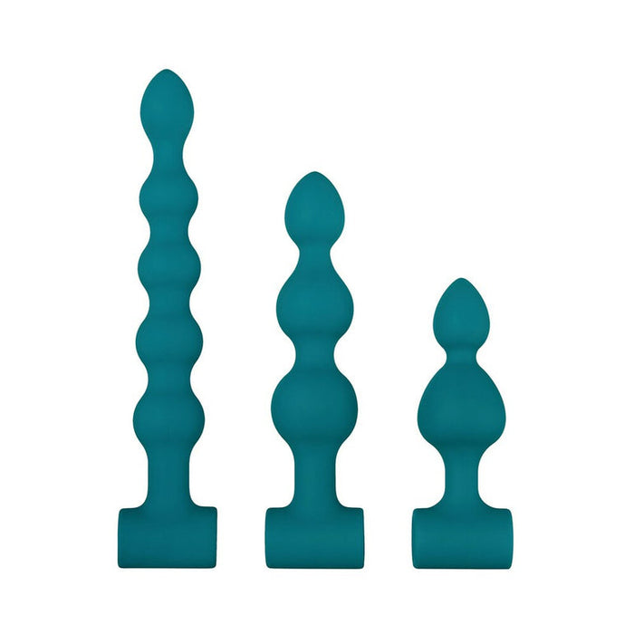 The Bumpy 3-Piece Beaded Anal Plug Set with Vibrating Bullet features three teal silicone plugs of different sizes, each with a beaded design and flat base for safe use, displayed vertically against a white background.
