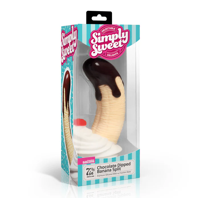 The Chocolate Dipped Banana Split Silicone Dildo - Pre Order is shaped like a banana dipped in chocolate with a whipped cream swirl base. It comes in blue and white "Simply Sweet" branded packaging with playful product details.