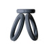 Three black silicone rings from the Perfect Fit Play Zone Cock Ring Kit stand upright and lean against each other, with a third flat ring balanced on top. All three rings have "PERFECT FIT BRAND" labels and are set against a white background.