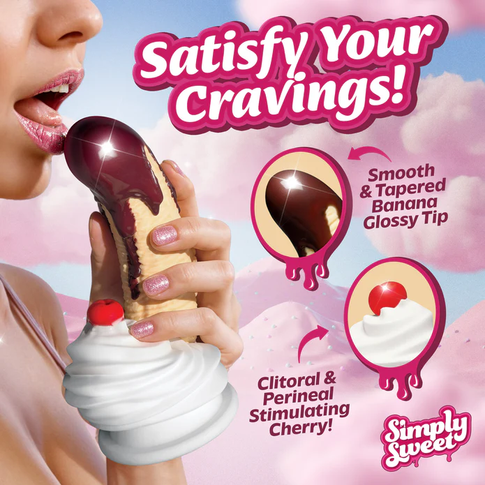 A person holds the Chocolate Dipped Banana Split Silicone Dildo with Suction Cup, featuring a smooth, tapered banana glossy tip, body-safe silicone, and a clitoral & perineal stimulating cherry detail on the whipped cream base.