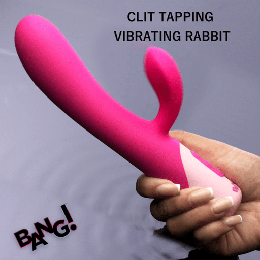 A hand holds the Clit Tapping Rabbit Flexible Silicone Vibrator above a reflective surface. Black text reads "CLIT TAPPING VIBRATING RABBIT," highlighting G-spot stimulation. "BANG!" appears boldly at the bottom left.