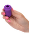 Model holding Sugar Rush Clitoral Suction Vibrator with Lid 