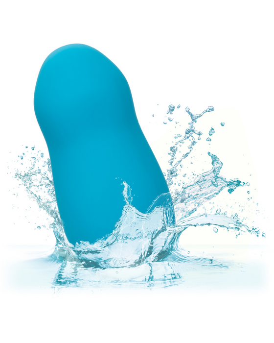Blue Sugar Dream Palm Sized Clitoral Vibrator with Lid in splash of water 