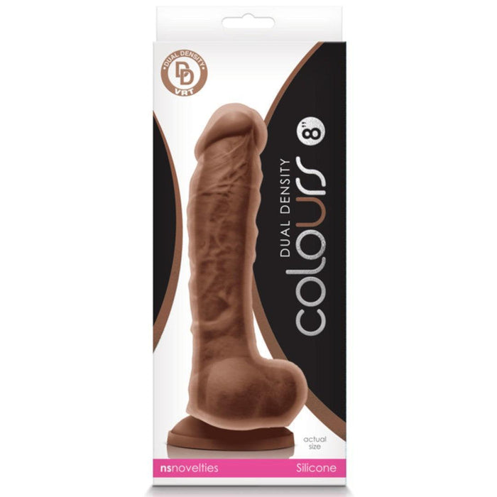 Packaging for the Colours Long 9.5 Inch Dual Density Medium Tone Silicone Dildo with Balls features a realistic platinum-grade silicone toy in brown, suction base, strap-on compatibility, actual size image, and clear brand details.