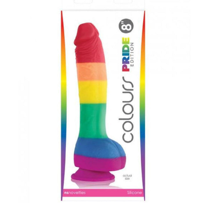 The Colours Pride Rainbow Long Thick Silicone 9.5 Inch Dildo is shown in vibrant packaging with a rainbow border, labeled "actual size," and features a sturdy suction cup base.