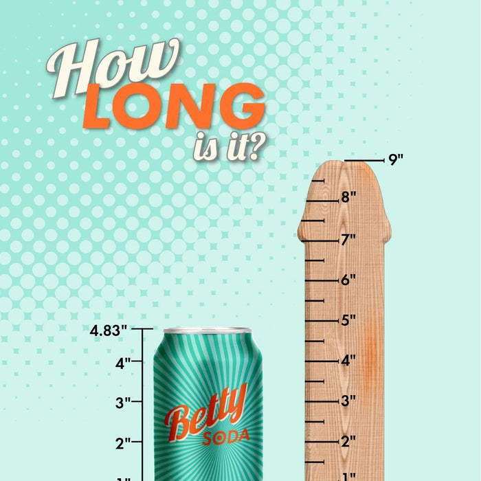 A 4.83-inch Betty Soda can stands beside the Colours Realistic Long 9.5 inch Medium Tone Silicone Dildo, which is marked with inches up to 9. Text above asks, "How long is it?" in a stylized font.