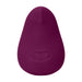 The Dame Pom Hand Held Flexible Vibrator in Plum is a small, pear-shaped device made from medical grade silicone, featuring a smooth surface and a single indented front button, shown against a white background.