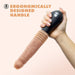 A hand holds the Blush Dr. Knight Vibrating Thrusting Gyrating Realistic Silicone Dildo in Vanilla, featuring an ergonomic black handle. The text "ERGONOMICALLY DESIGNED HANDLE" is displayed in capital letters on the left side of the image.