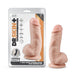 The Dr. Skin Girthy Short Thick Dildo - Vanilla, a realistic, flesh-toned dildo with a suction cup base, is shown beside its packaging highlighting its lifelike feel and strap-on harness compatibility.