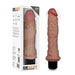 The Dr. Webber Long 9.75 Inch Vibrating Silicone Dildo, featuring a flexible shaft, detailed veins, and a pronounced head, stands upright by its packaging that showcases the product and the "Dr. Skin" brand name.