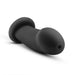 The Elvira Short Thick Smooth 6 Inch Suction Cup Dildo in Black Silicone features a rounded tip, flexible shaft, and flared base for internal stimulation, shown on a white background.