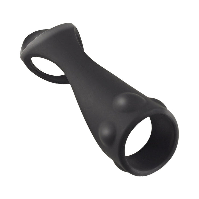 The Enhancer Textured Flexible Cock Strap & Ball Stretcher is a black silicone ring with an hourglass shape, two large circular openings, and raised dots on one side for added stimulation.