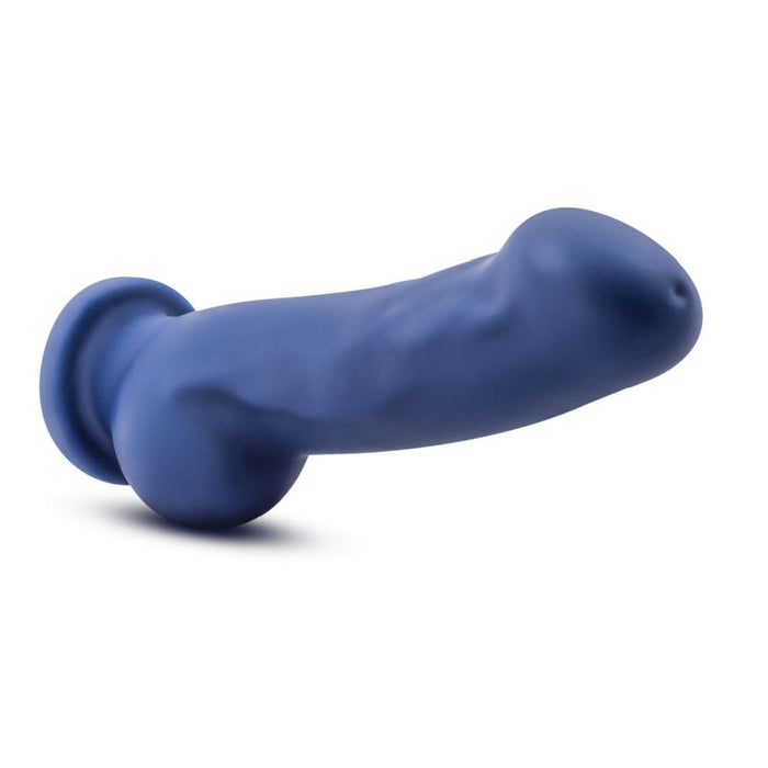 The Ergo Semi-Realistic 7.5 Inch Blue Silicone Suction Cup Dildo, with a lifelike shape, pronounced head and veins, and flared base for G-spot or prostate pleasure, is shown on a white background.