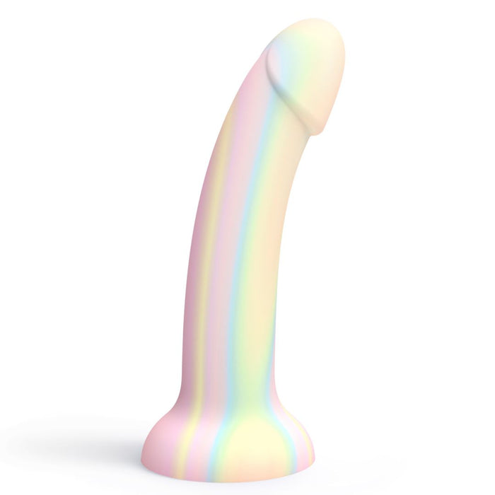The Fantasia Smooth 7 inch Glow in the Dark Silicone Dildo with Suction Cup features pastel gradients of pink, yellow, green, and blue in a realistic shape, standing upright on its flared base against a white background.