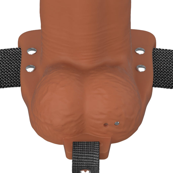 A close-up of the Fantasy X-Tensions Elite Vibrating Hollow 7 Inch Silicone Dildo & Strap-On Harness in Chocolate, designed to enhance pleasure and intimacy.