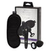 The Fifty Shades of Grey Come to Bed Kit includes a black blindfold, vibrating plug, vibrator, and jeweled butt plug—ideal for couples' sensual exploration, all displayed in front of the product packaging.