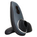 The Fifty Shades of Grey Desire Blooms Kit is a gray and black handheld clitoral stimulator with a circular front opening, plus and minus buttons on top, a silver rim, and an upright flat base.