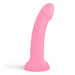 The Glitzy Smooth 7 inch Pink Sparkle Silicone Dildo with Suction Cup, featuring a curved, realistic shape and flared base, stands upright against a white background.